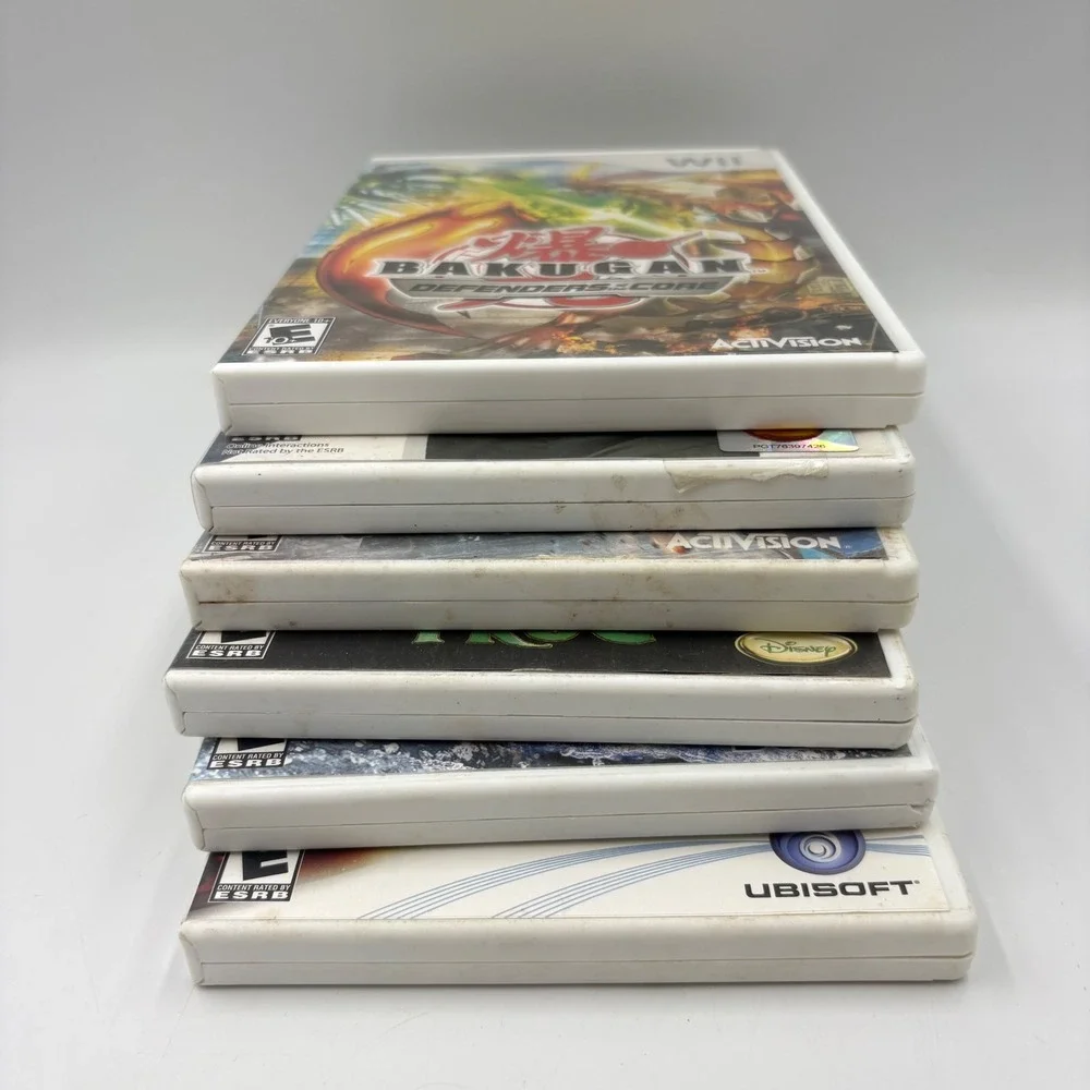 Nintendo Wii Games Bundle 6-Game Lot Various Good Bakugan Transformers Disney